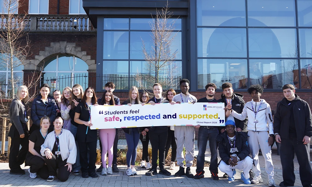 Students holding a banner